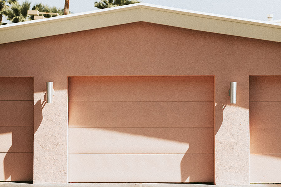 Driveway of a pink garage